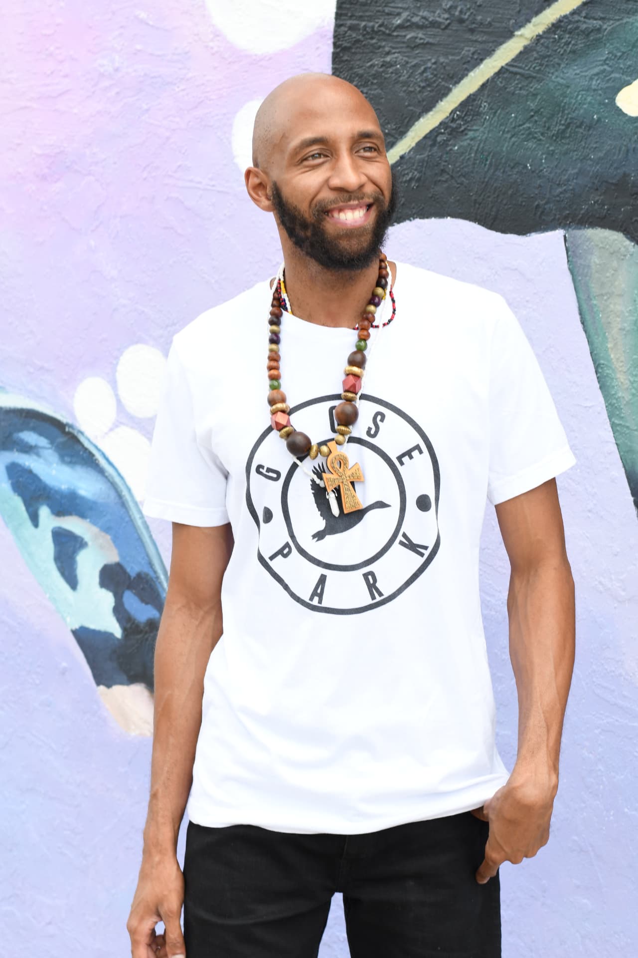 Goose Pärk, founder of Goose Park Productions, wearing a Goose Park logo tee